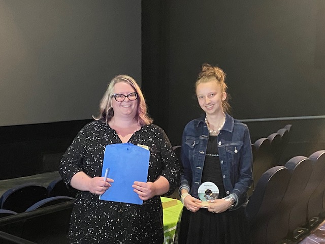 2025 Grey Bruce Youth Film Festival senior category winner Haidyn Ruthven stands with Youth Services Specialist Katie McLeish
